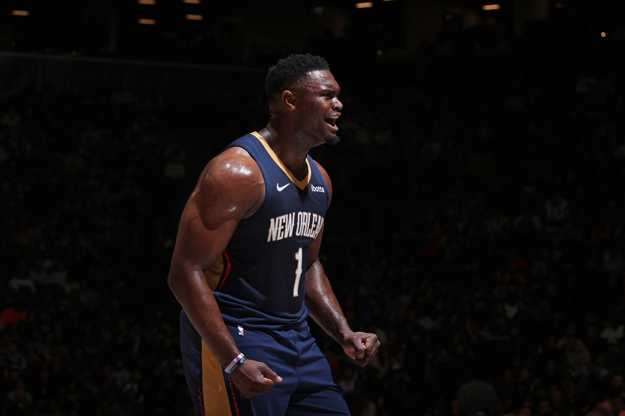 Zion Williamson #1 of the New Orleans Pelicans celebrates during the game against the Brooklyn Nets on March 19, 2024 at Barclays Center in Brooklyn, New York. NOTE TO USER: User expressly acknowledges and agrees that, by downloading and or using this Photograph, user is consenting to the terms and conditions of the Getty Images License Agreement. Mandatory Copyright Notice: Copyright 2024 NBAE (Photo by Nathaniel S. Butler/NBAE via Getty Images)