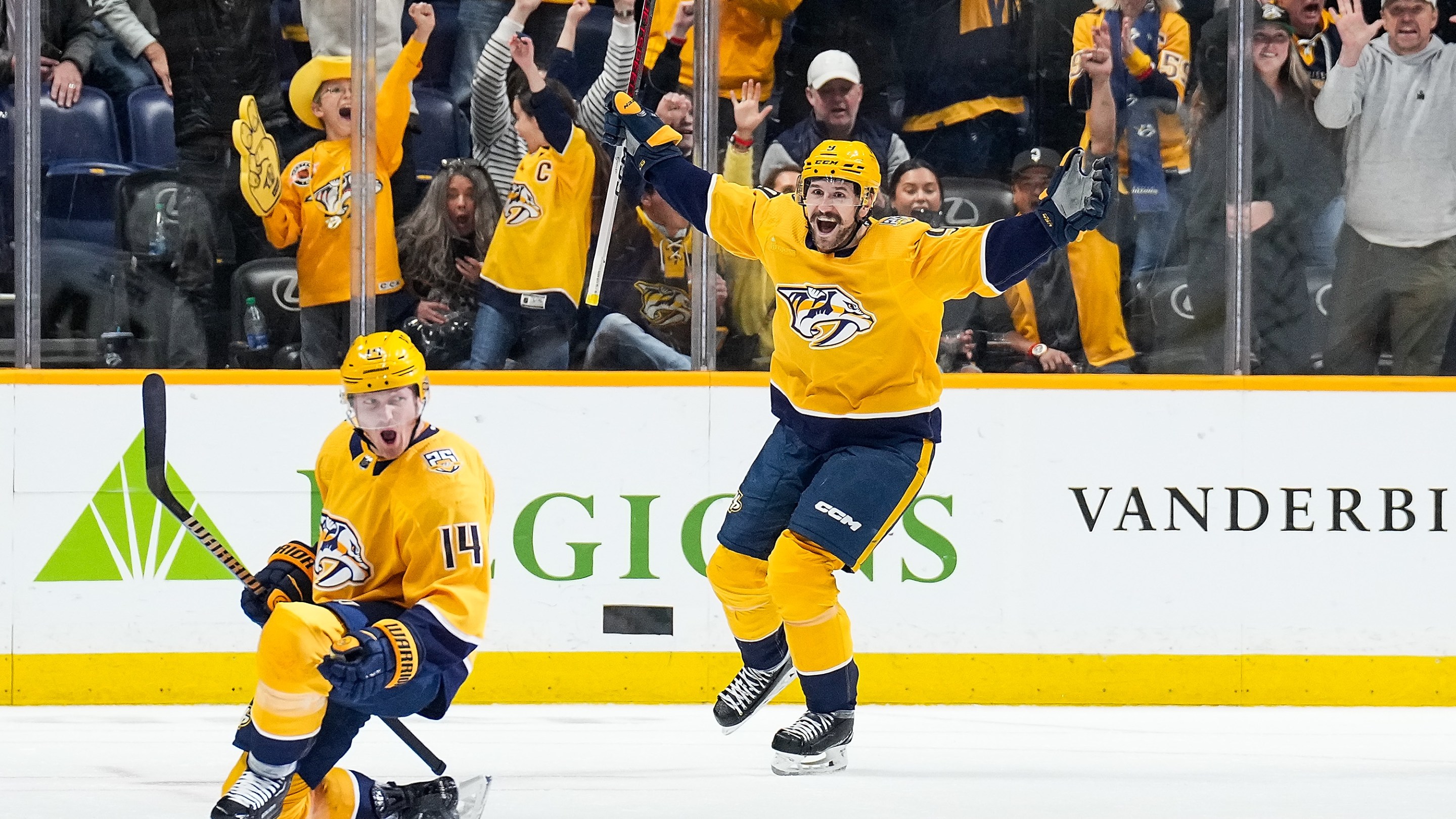 NASHVILLE, TENNESSEE - MARCH 26: Gustav Nyquist #14 celebrates his power play goal with Filip Forsberg #9 of the Nashville Predators against the Vegas Golden Knights during an NHL game at Bridgestone Arena on March 26, 2024 in Nashville, Tennessee. (Photo by John Russell/NHLI via Getty Images)