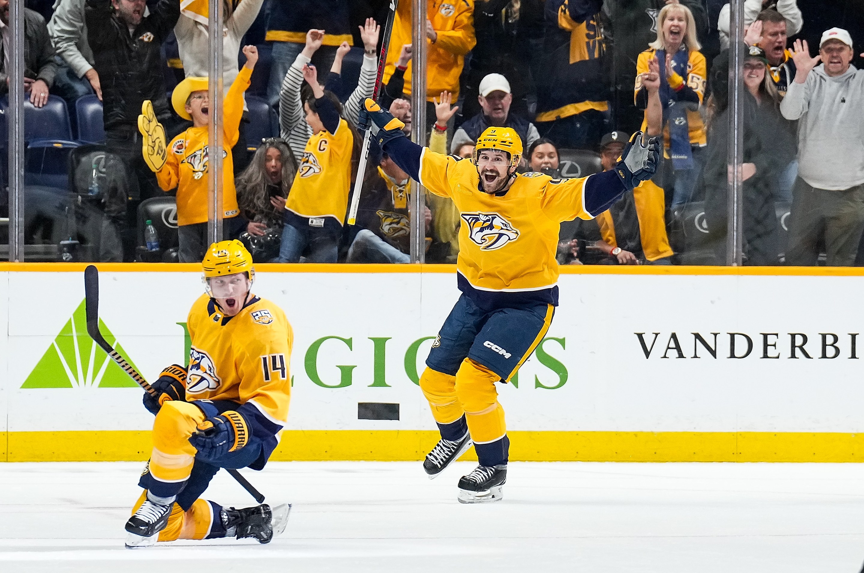 NASHVILLE, TENNESSEE - MARCH 26: Gustav Nyquist #14 celebrates his power play goal with Filip Forsberg #9 of the Nashville Predators against the Vegas Golden Knights during an NHL game at Bridgestone Arena on March 26, 2024 in Nashville, Tennessee. (Photo by John Russell/NHLI via Getty Images)