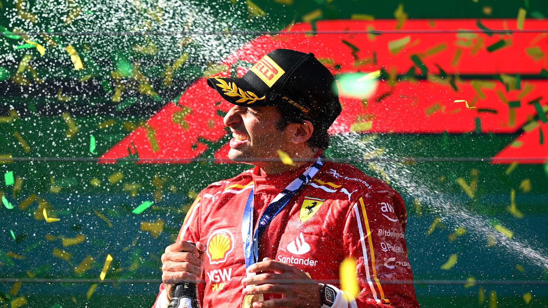 Race winner Carlos Sainz of Spain and Ferrari celebrates on the podium during the F1 Grand Prix of Australia at Albert Park Circuit on March 24, 2024 in Melbourne, Australia.
