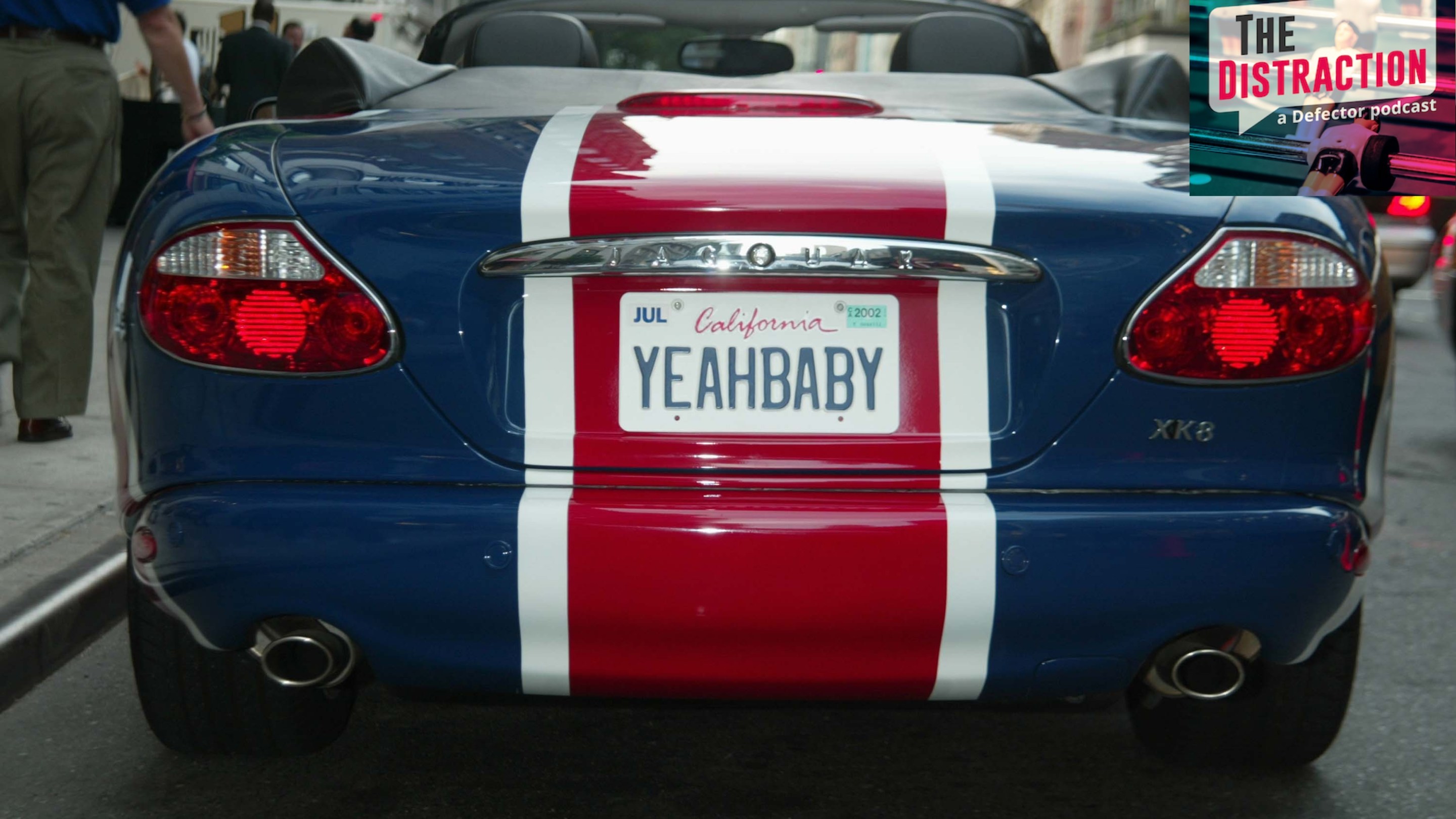 Austin Powers's XK8 Union Jack Jaguar convertible at the New York premiere of "Austin Powers in Goldmember" with The Distraction logo at upper right.