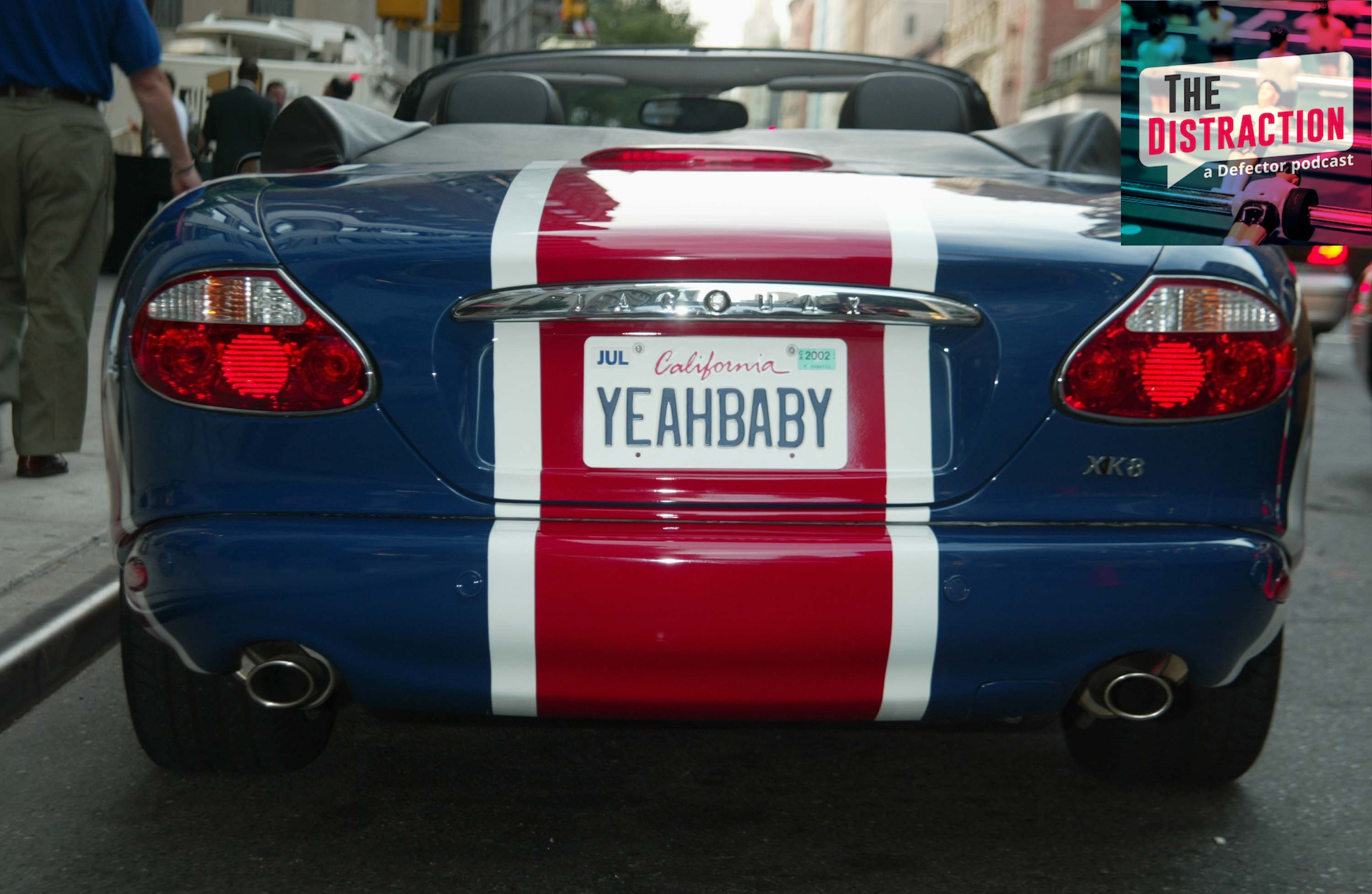 Austin Powers's XK8 Union Jack Jaguar convertible at the New York premiere of "Austin Powers in Goldmember" with The Distraction logo at upper right.