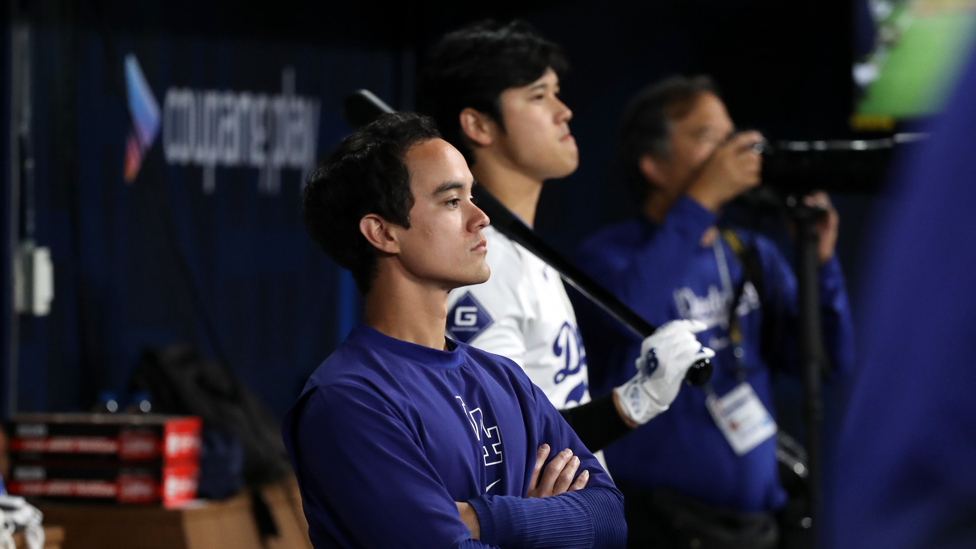 Shohei Ohtani #17 and Will Ireton of the Los Angeles Dodgers are seen in the dugout during the 2024 Seoul Series game between San Diego Padres and Los Angeles Dodgers.