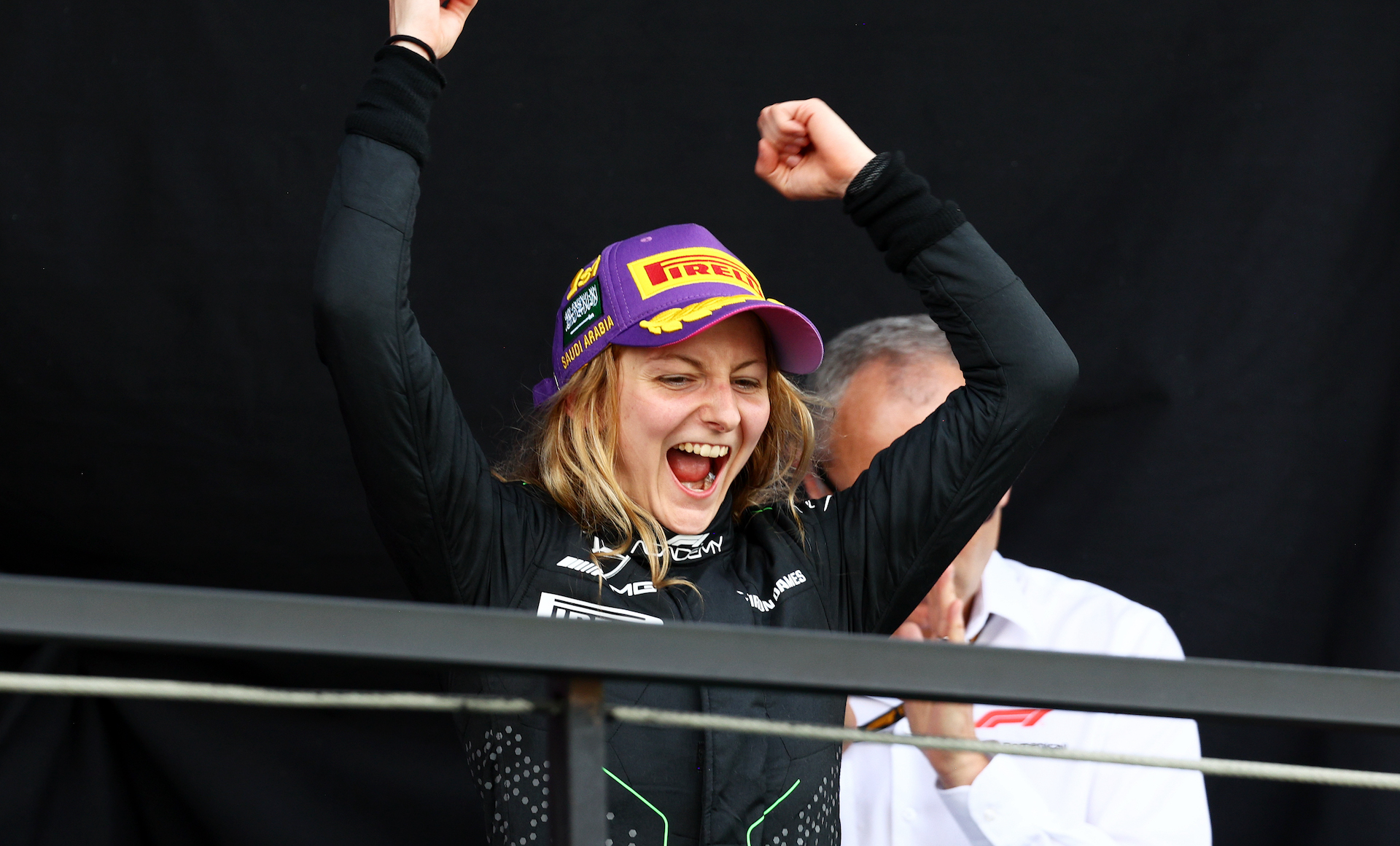 Race winner Doriane Pin of France and PREMA Racing (28) celebrates on the podium during Round 1 Jeddah race 2 of the F1 Academy at Jeddah Corniche Circuit.