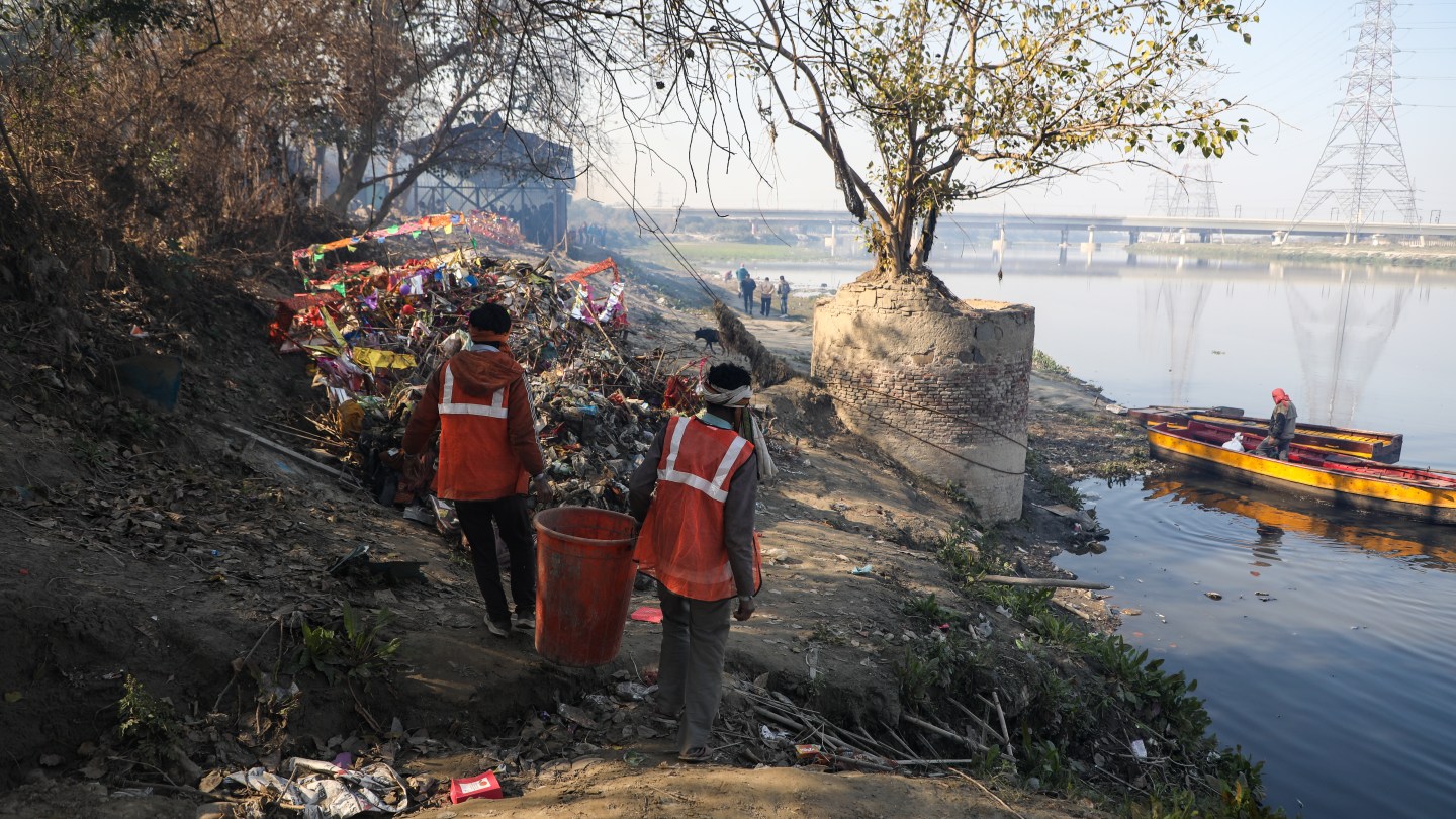 The polluted riverbank of the Yamuna