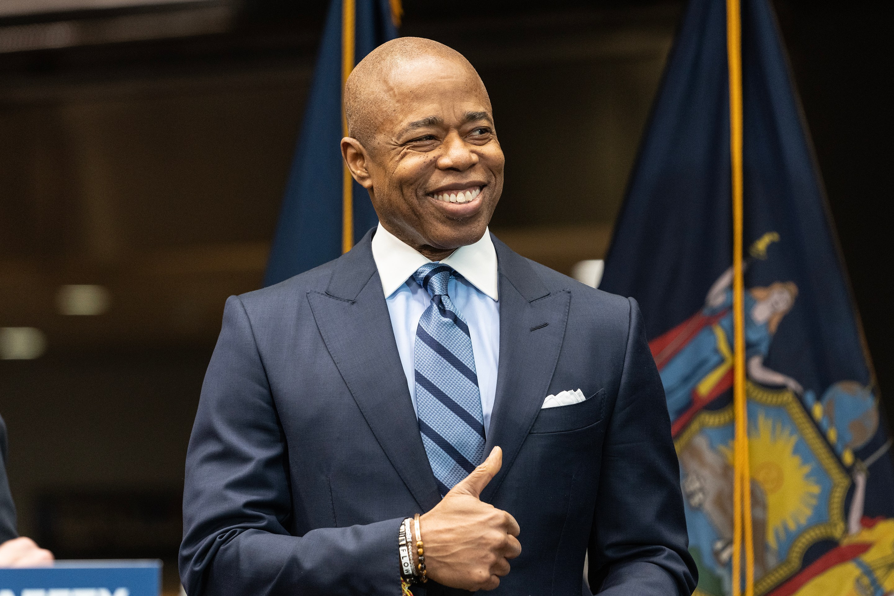 New York City Mayor Eric Adams smiles and gives a thumbs-up at an MTA event in January of 2023.