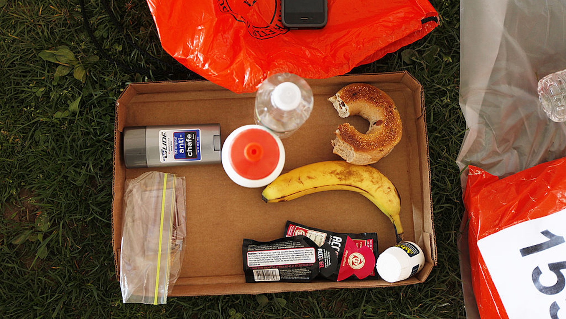 A box of essentials - body glide, water, bagel, banana, Advil, and Accel Gel. The 116th Boston Marathon starts in Hopkinton in Hopkinton, Mass. on Monday, April 16, 2012.