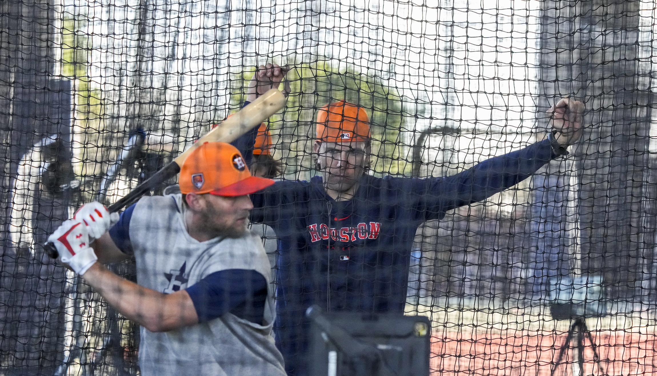WEST PALM BEACH, FLORIDA - FEBRUARY 15: Houston Astros hitting coach Troy Snitker watches infielder Grae Kessinger hit in the cages during workouts for Houston Astros pitchers and catchers at CACTI Park of the Palm Beaches on Thursday, Feb. 15, 2024, in West Palm Beach, Florida. (Karen Warren/Houston Chronicle via Getty Images)