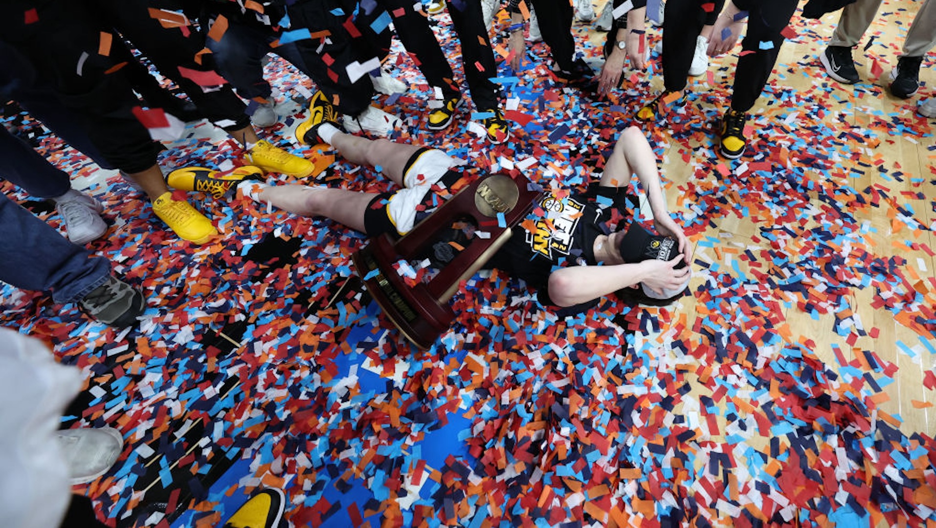 Caitlin Clark #22 of the Iowa Hawkeyes celebrates on the court after defeating the LSU Tigers during the Elite Eight round of the 2024 NCAA Women's Basketball Tournament held at MVP Arena on April 1, 2024 in Albany, New York.