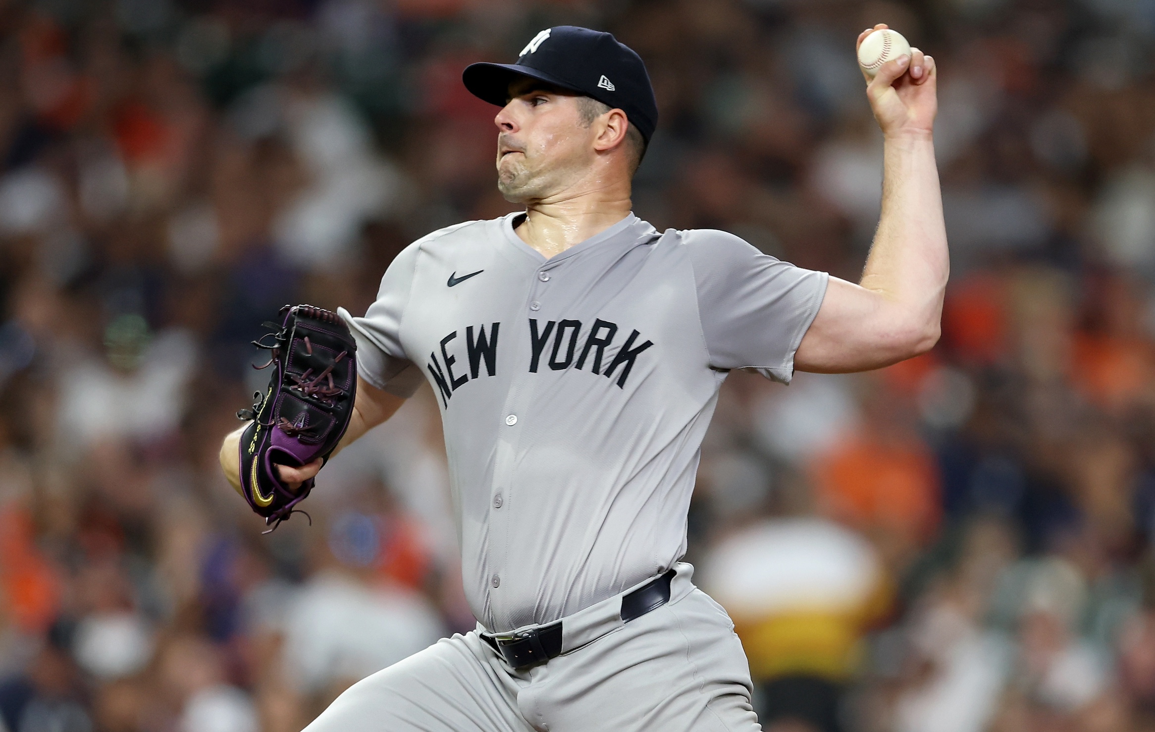 HOUSTON, TEXAS - MARCH 29: Carlos Rodon #55 of the New York Yankees pitches in the second inning against the Houston Astros at Minute Maid Park on March 29, 2024 in Houston, Texas. (Photo by Tim Warner/Getty Images)