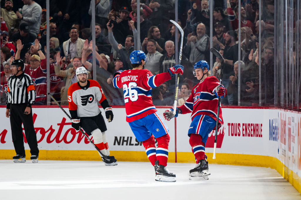 Christian Dvorak celebrates after scoring a goal for the Canadiens