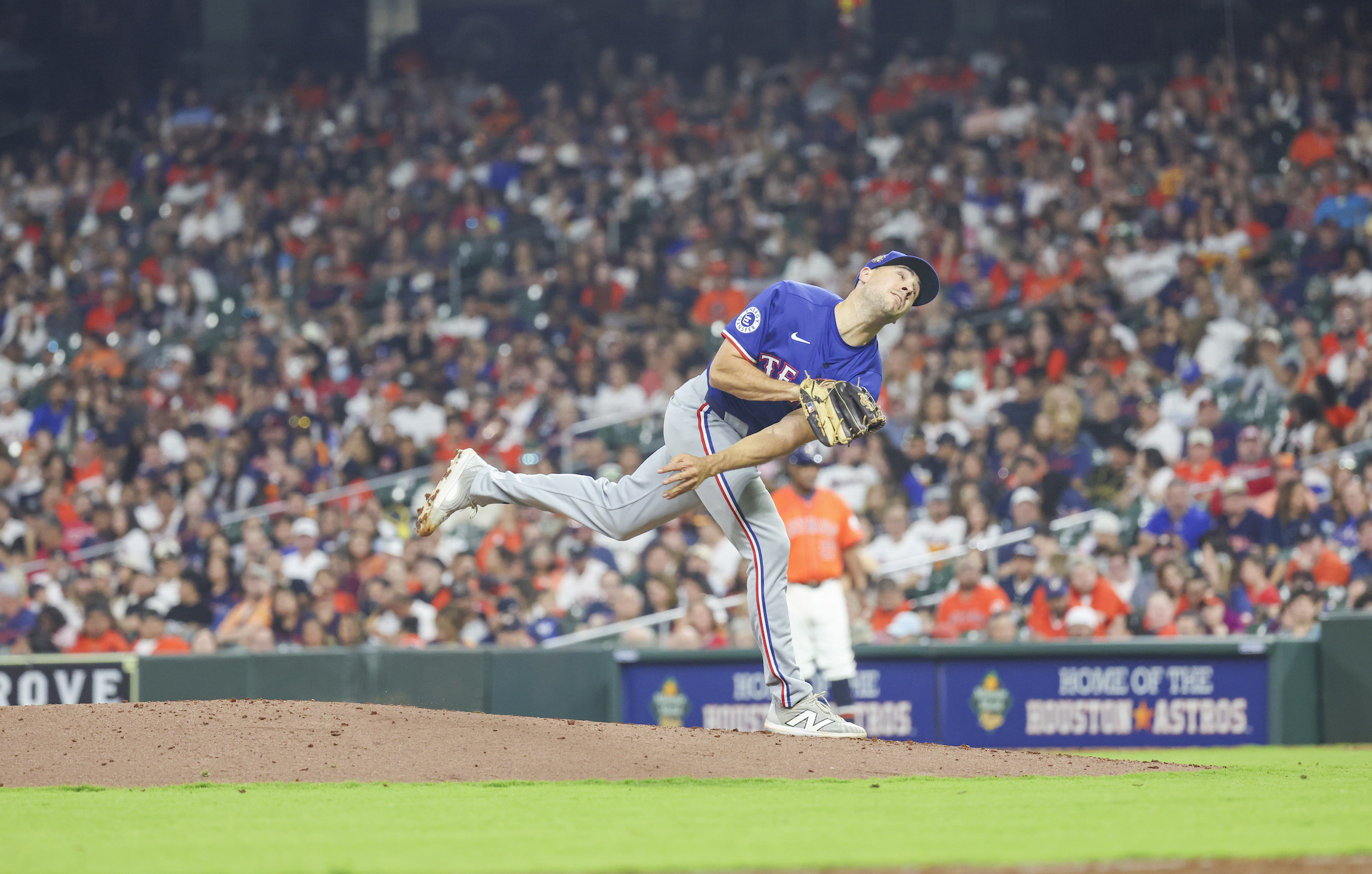 Brock Burke pitches for the Texas Rangers