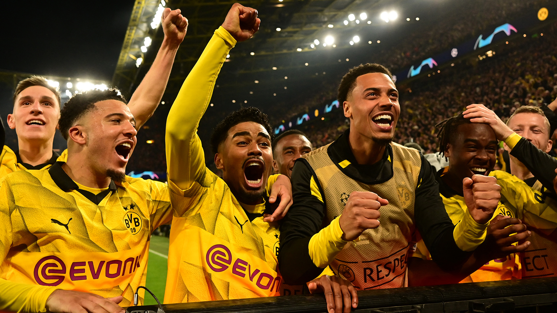 Dortmund's players celebrate scoring their forth goal 4:2 during the UEFA Champions League quarter-final second leg football match between Borussia Dortmund and Atletico Madrid in Dortmund, western Germany on April 16, 2024.