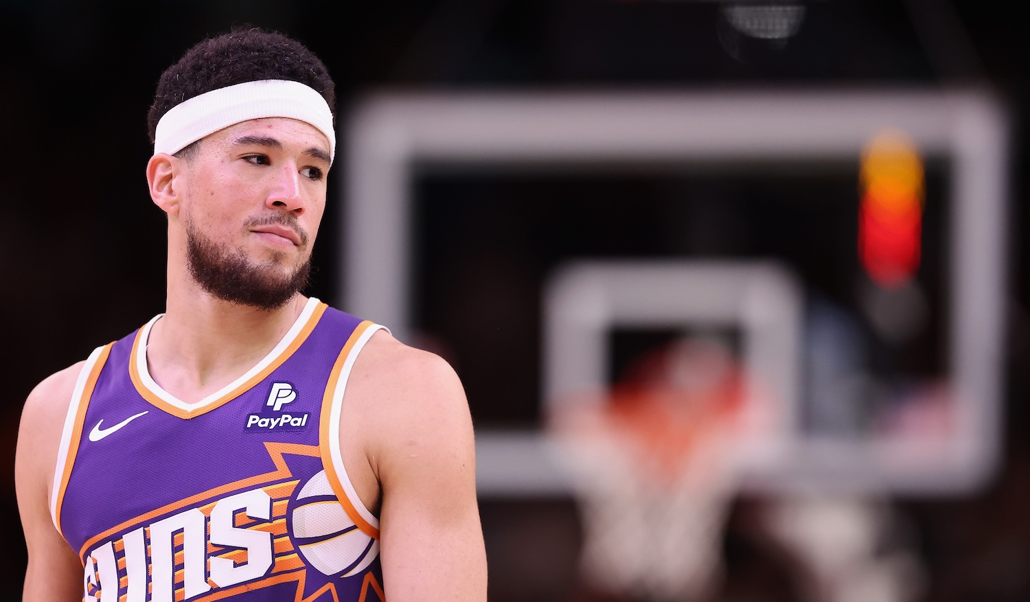 PHOENIX, ARIZONA - APRIL 09: Devin Booker #1 of the Phoenix Suns reacts during the second half of the NBA game against the LA Clippers at Footprint Center on April 09, 2024 in Phoenix, Arizona. NOTE TO USER: User expressly acknowledges and agrees that, by downloading and or using this photograph, User is consenting to the terms and conditions of the Getty Images License Agreement. (Photo by Christian Petersen/Getty Images)