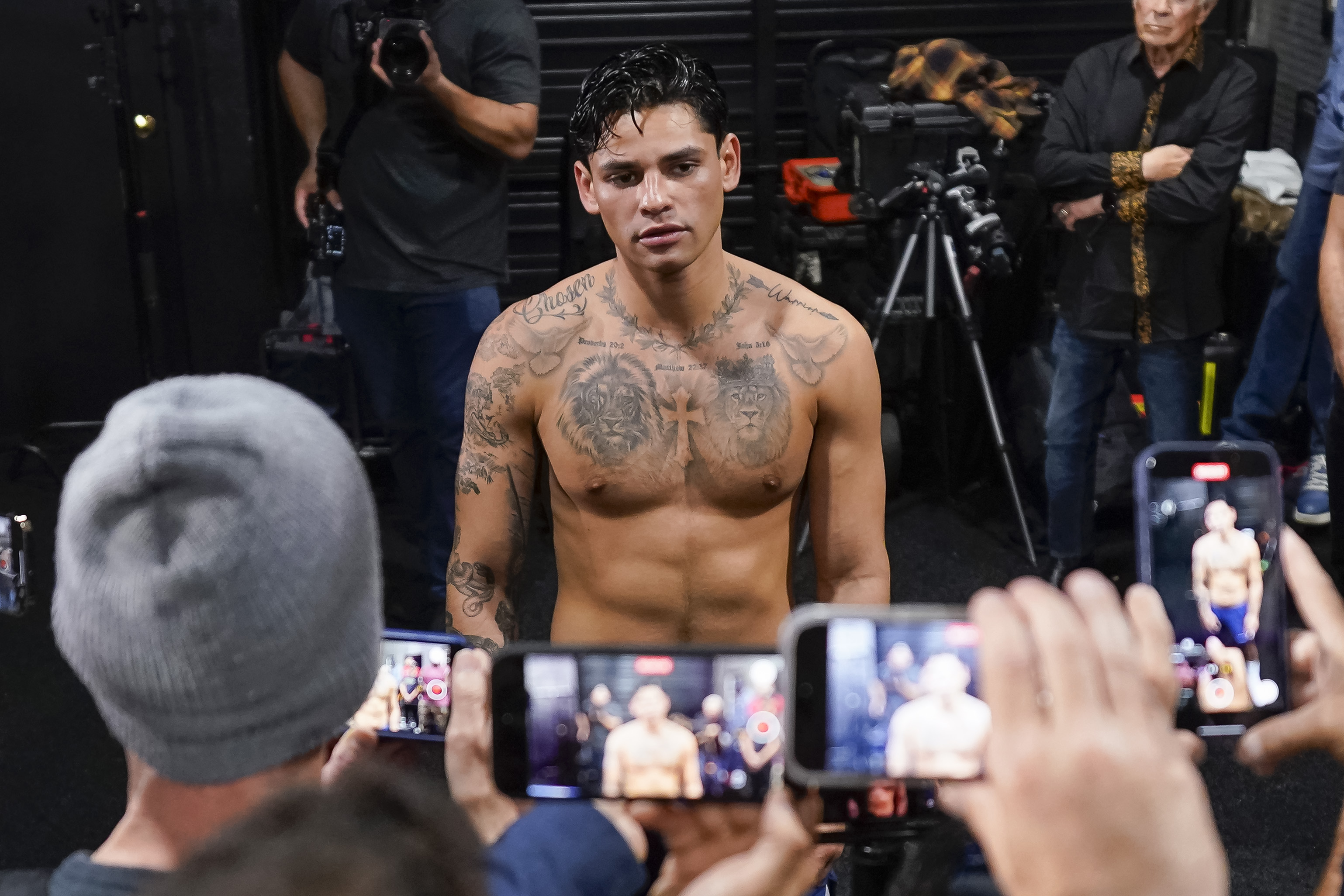 Ryan Garcia speaks to reporters during a media workout at World Class Boxing Gym on April 9, 2024 in Dallas, Texas.