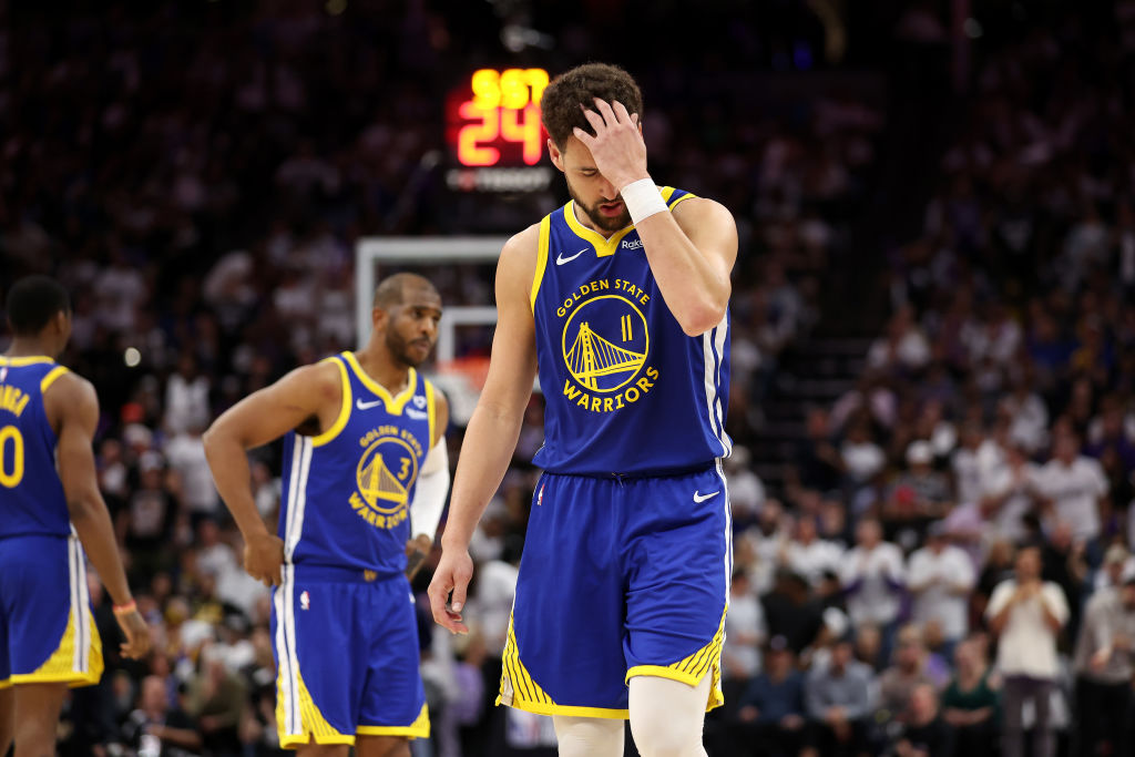Klay Thompson reacts after missing a shot