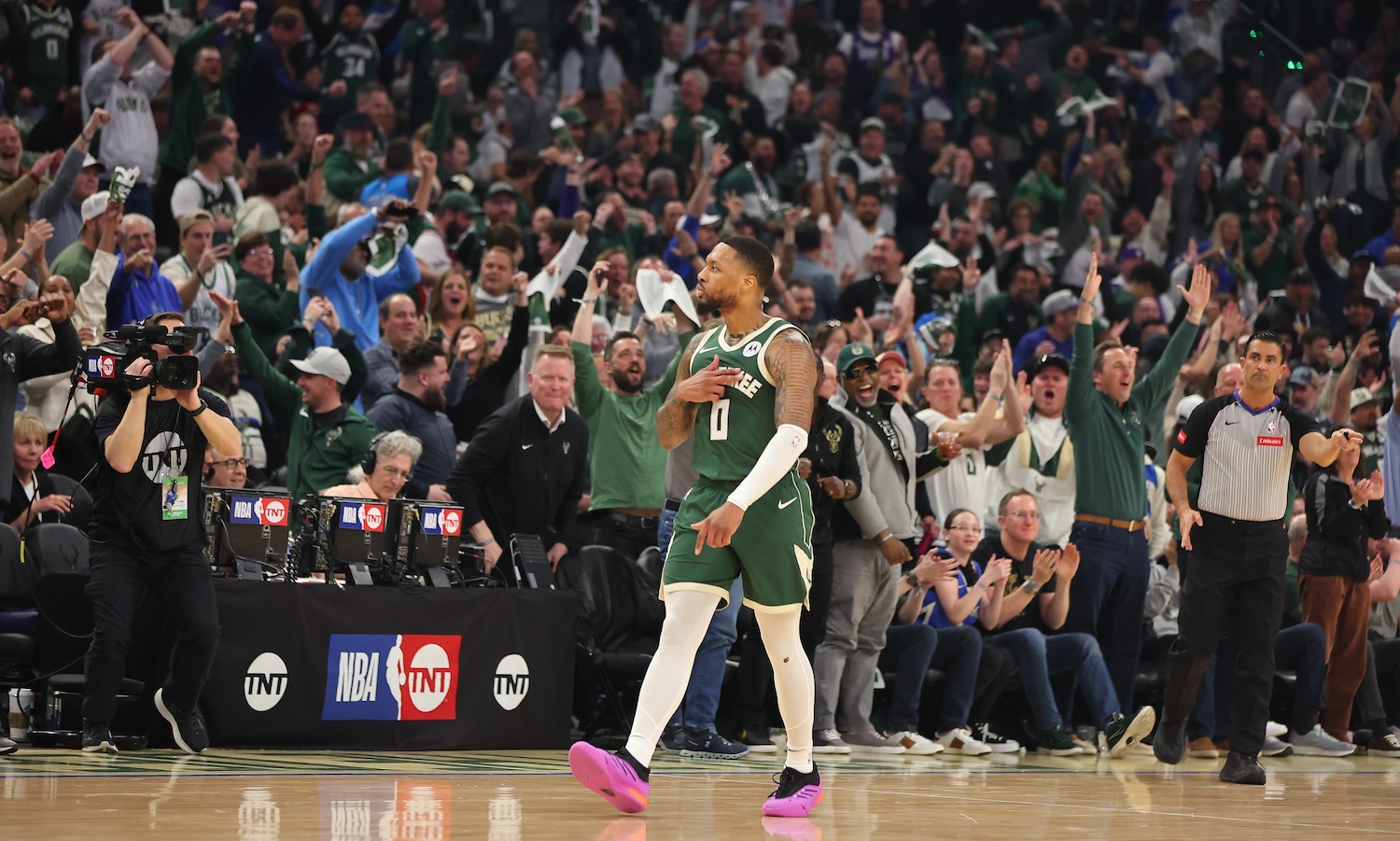 MILWAUKEE, WISCONSIN - APRIL 21: Damian Lillard #0 of the Milwaukee Bucks reacts to a three point shot during the first half of game one of the Eastern Conference First Round Playoffs against the Indiana Pacers at Fiserv Forum on April 21, 2024 in Milwaukee, Wisconsin. NOTE TO USER: User expressly acknowledges and agrees that, by downloading and or using this photograph, User is consenting to the terms and conditions of the Getty Images License Agreement. (Photo by Stacy Revere/Getty Images)