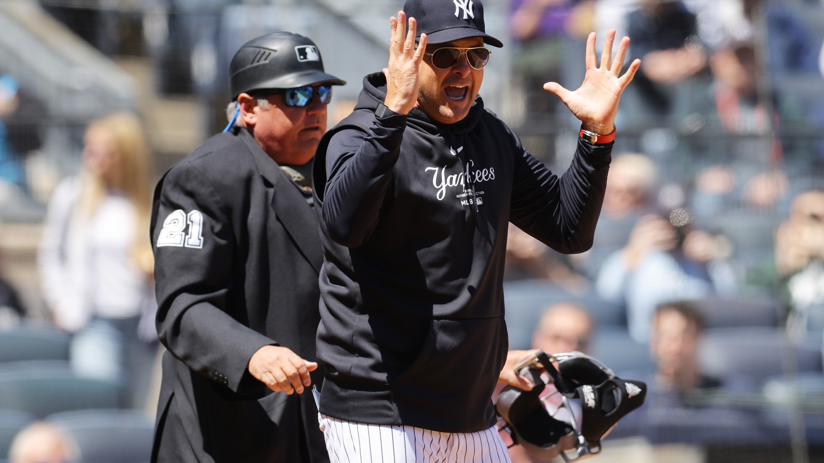 Yankees manager Aaron Boone argues with home plate umpire Hunter Wendelstedt after being ejected in the first inning of his team's game against the Oakland Athletics at Yankee Stadium on April 22, 2024 in New York City.