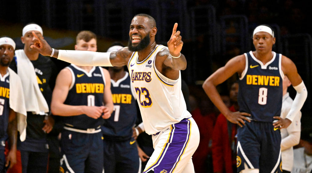 Los Angeles Lakers player LeBron James waving his hands on the court reacting to a ball going out of bounds and a ref's decision against the Denver Nuggets in Game 4 of the first round series in the NBA Playoffs.