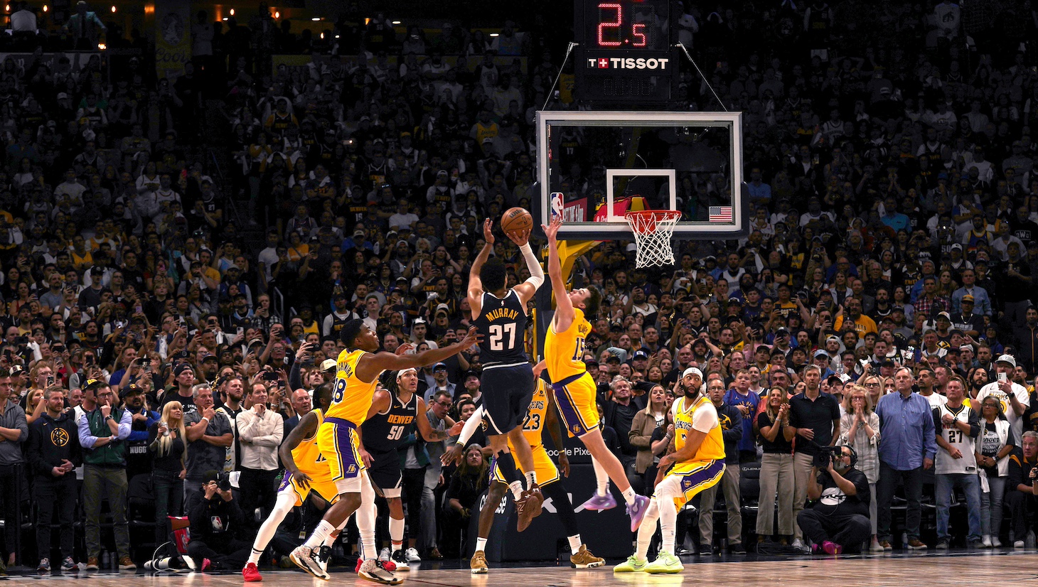 Jamal Murray #27 of the Denver Nuggets makes the game winning shot during the game against the Los Angeles Lakers during Round One Game Five of the 2024 NBA Playoffs on April 29, 2024 at the Ball Arena in Denver, Colorado.