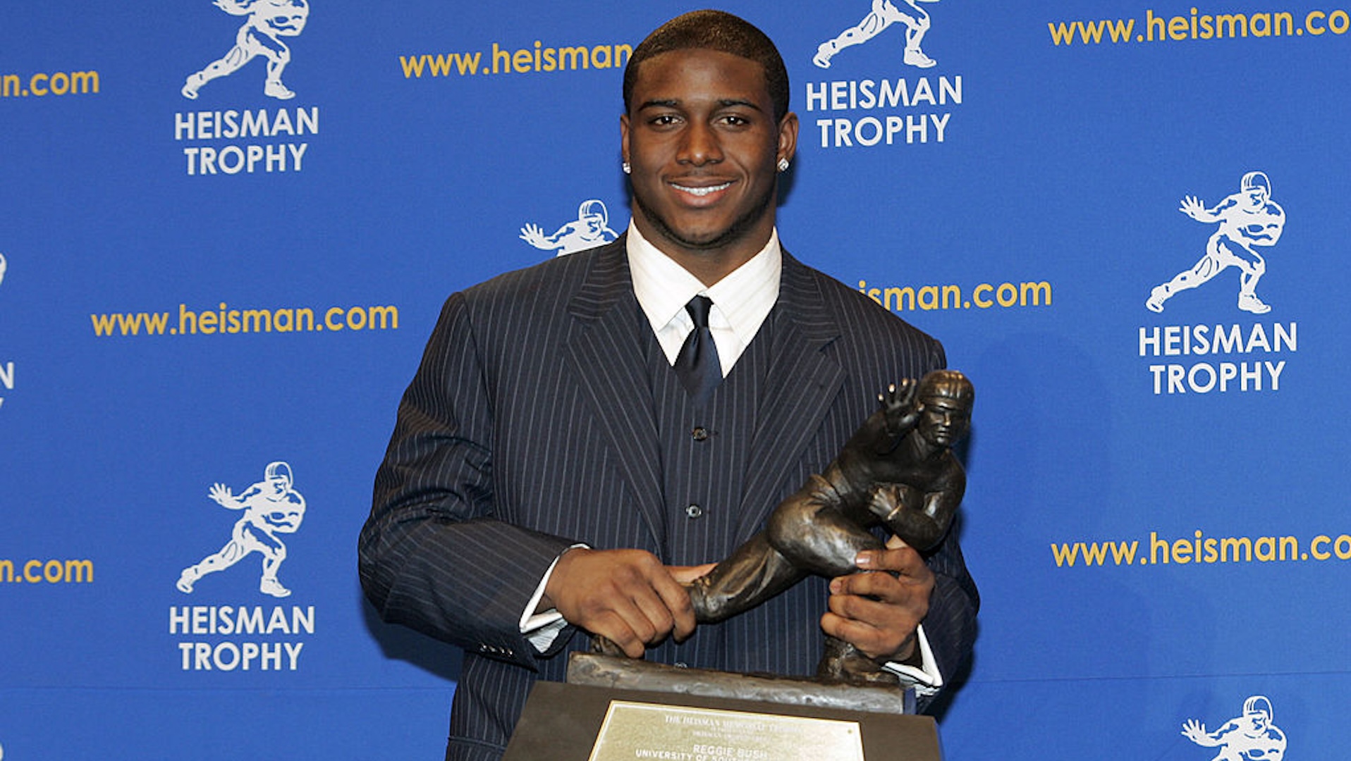 Reggie Bush, University of Southern California tailback holds the Heisman Trophy during the 2005 Heisman Trophy presentation at the Hard Rock Cafe in New York City, New York on December 10, 2005.