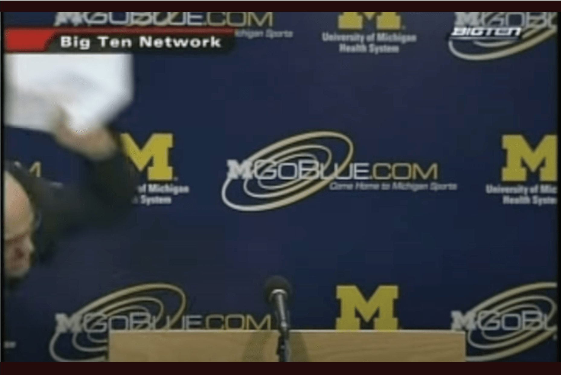 Kevin Borseth slams down piece of paper at a 2008 postgame press conference