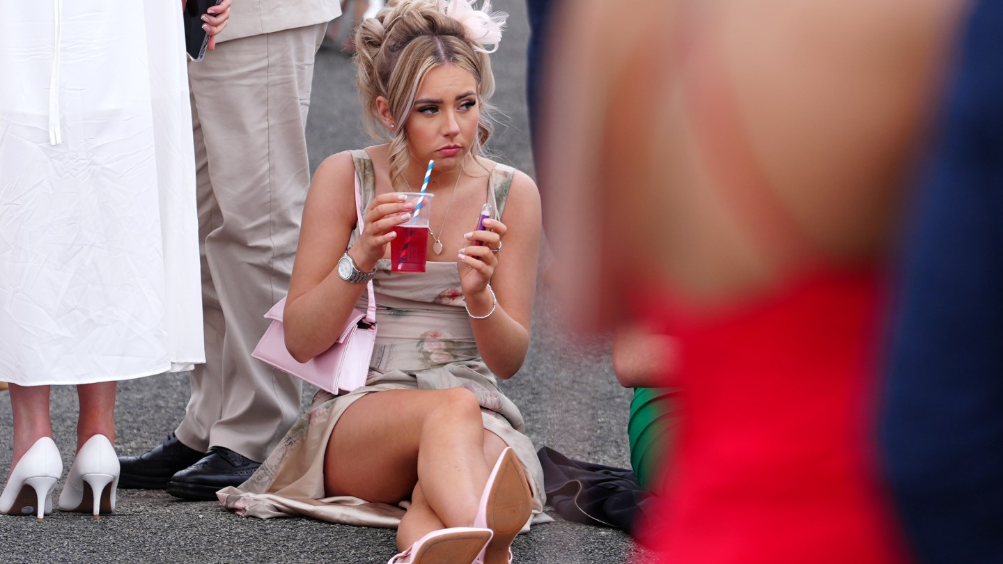 Racegoers on day two of the 2024 Randox Grand National Festival at Aintree Racecourse, Liverpool.