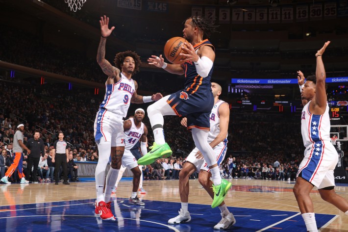 Jalen Brunson #11 of the New York Knicks passes the ball during the game against the Philadelphia 76ers on March 12, 2024.