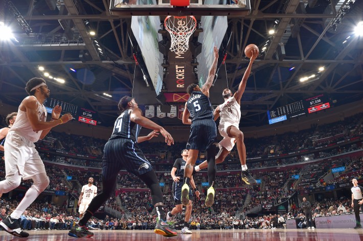 Evan Mobley #4 of the Cleveland Cavaliers drives to the basket during the game against the Orlando Magic on February 22, 2024.