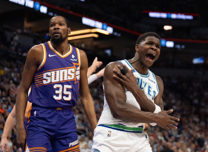 Minnesota Timberwolves guard Anthony Edwards (5) reacts after a non-call on Phoenix Suns forward Kevin Durant (35) in the first quarter. The Minnesota Timberwolves faced the Phoenix Suns in an NBA basketball game Sunday afternoon, April 14, 2024.