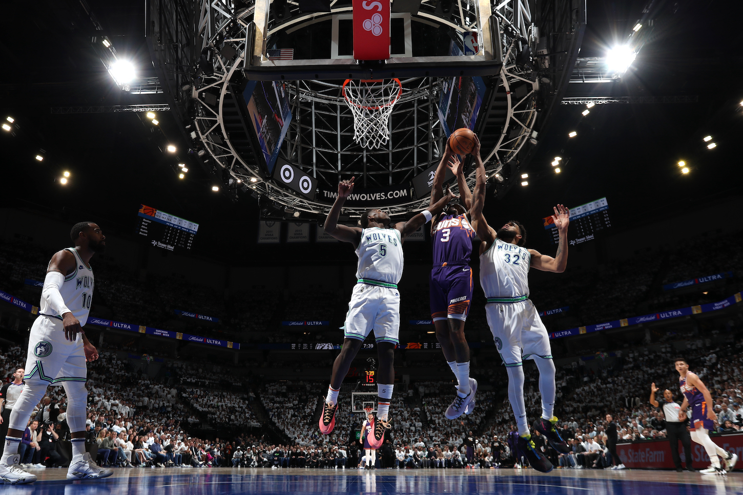 Bradley Beal of the Phoenix Suns goes up amid a forest of Minnesota Timberwolves arms in Game 1 of the Western Conference first-round playoffs.
