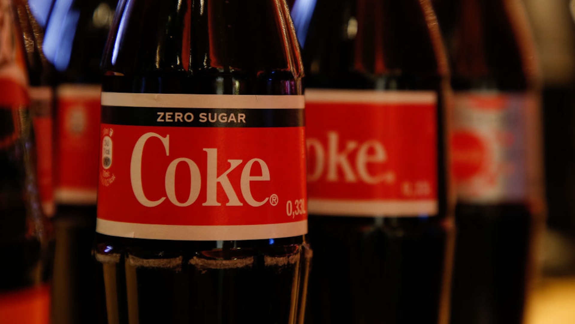 11 February 2020, Berlin: Bottles of the brand "Coca Cola" are lined up in the cinema Zoo Palast.