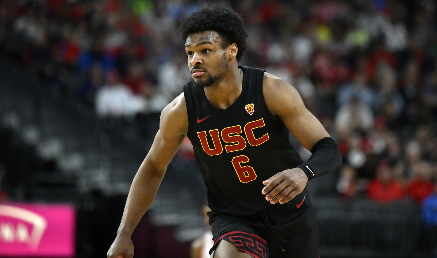 LAS VEGAS, NEVADA - MARCH 14: Bronny James #6 of the USC Trojans looks on in the second half of a quarterfinal game against the Arizona Wildcats during the Pac-12 Conference basketball tournament at T-Mobile Arena on March 14, 2024 in Las Vegas, Nevada. The Wildcats defeated the Trojans 70-49. (Photo by David Becker/Getty Images)