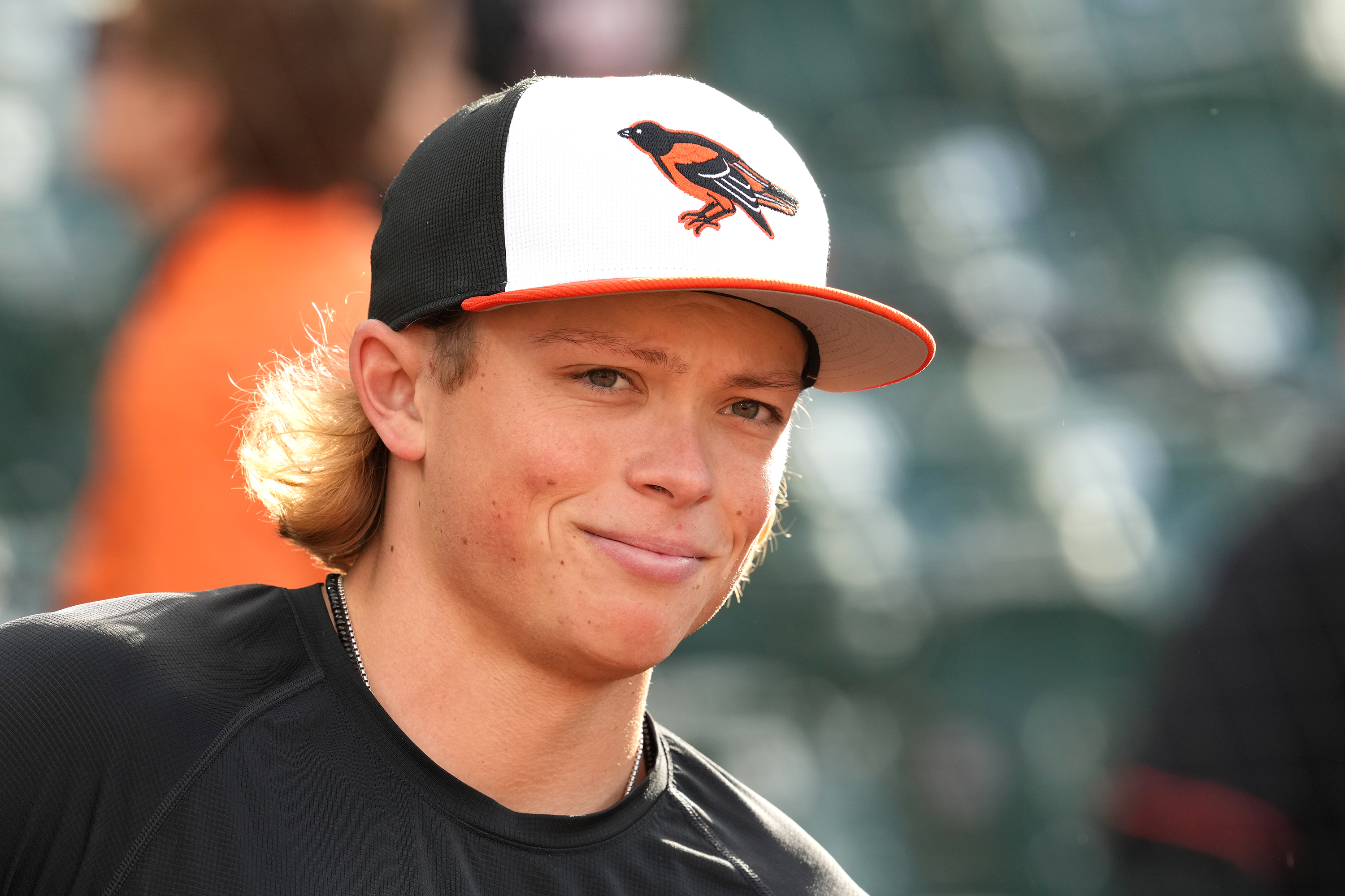 Jackson Holliday #7 of the Baltimore Orioles looks on during batting practice prior to a baseball game against the Milwaukee Brewers at Oriole Park at Camden Yards on April 12, 2024 in Baltimore, Maryland.