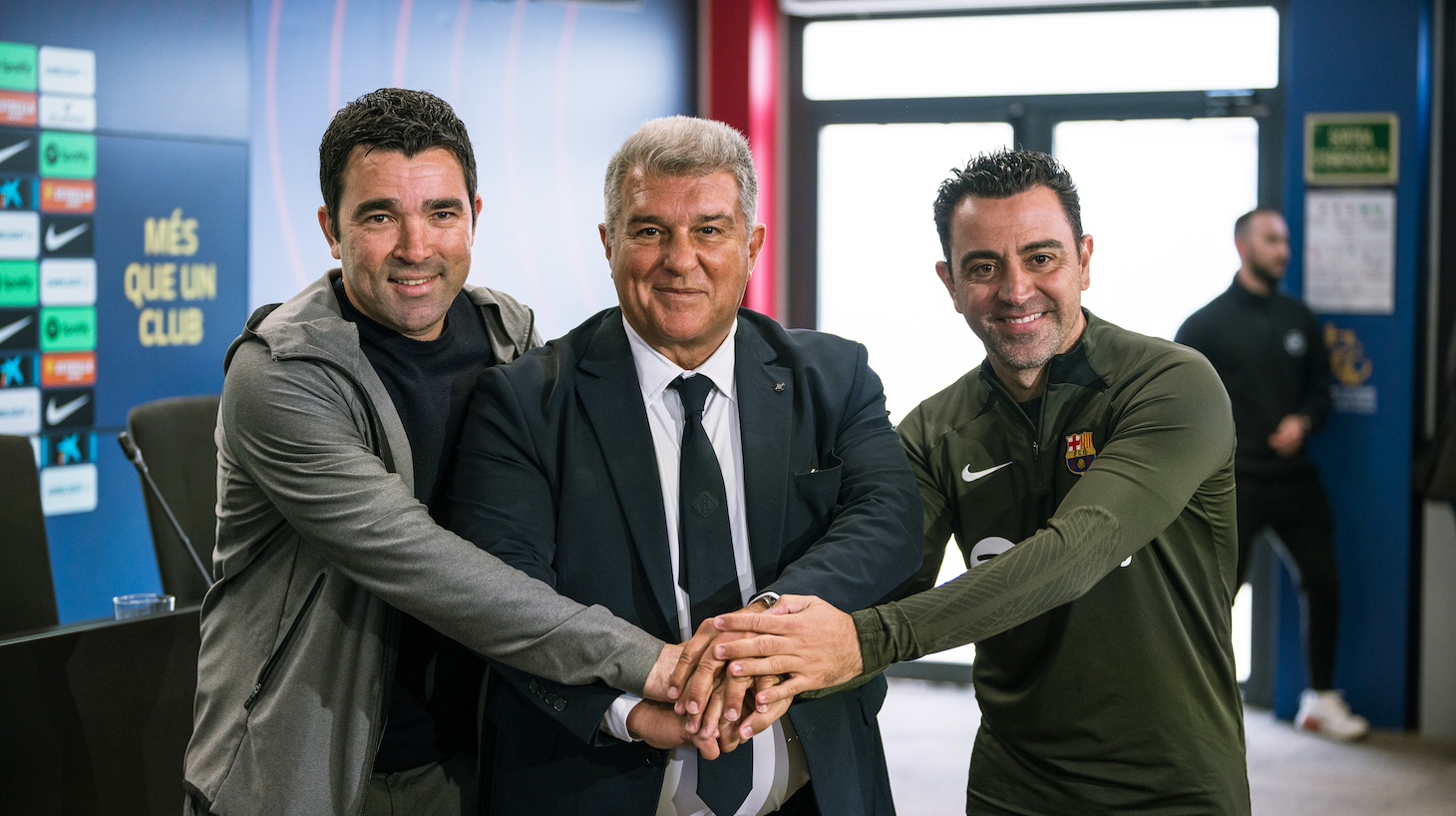 Xavi Hernandez, with Deco and Joan Laporta, during the press conference called by FC Barcelona to announce his continuity as coach of the club until June 2025, in Barcelona, Spain, on April 25, 2024.