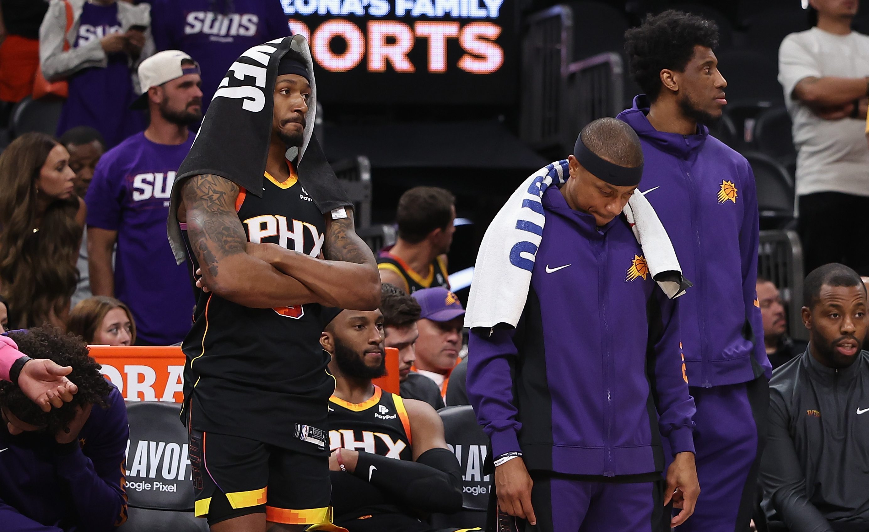 Bradley Beal #3, Josh Okogie #2, Isaiah Thomas #4 and Thaddeus Young #30 of the Phoenix Suns react on the bench during the second half of game four of the Western Conference First Round Playoffs at Footprint Center on April 28, 2024 in Phoenix, Arizona. They all look very sad.