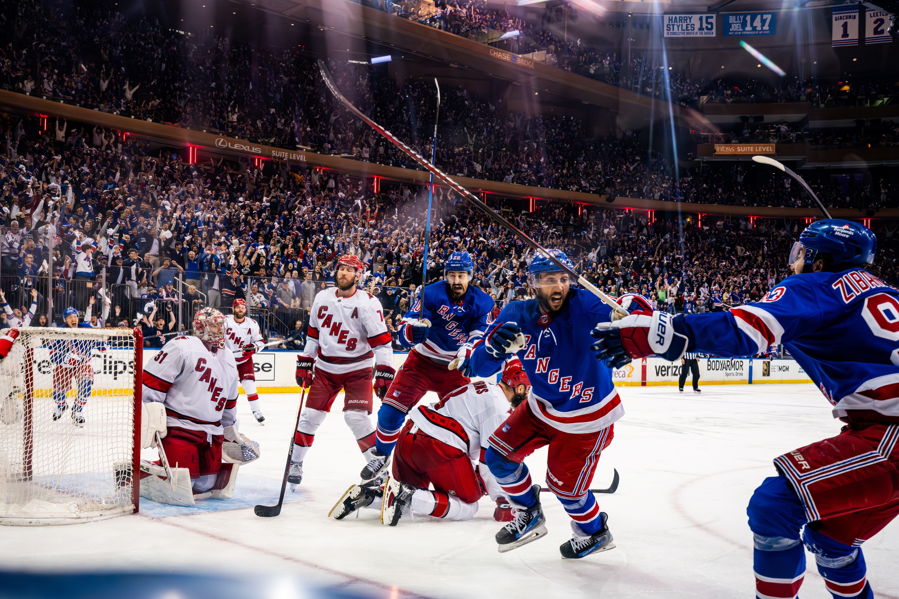 NEW YORK, NEW YORK - MAY 07: Vincent Trocheck #16 of the New York Rangers celebrates after scoring the game-winning goal in the second overtime to defeat the Carolina Hurricanes in Game Two of the Second Round of the 2024 Stanley Cup Playoffs at Madison Square Garden on May 07, 2024 in New York City. (Photo by Josh Lavallee/NHLI via Getty Images)