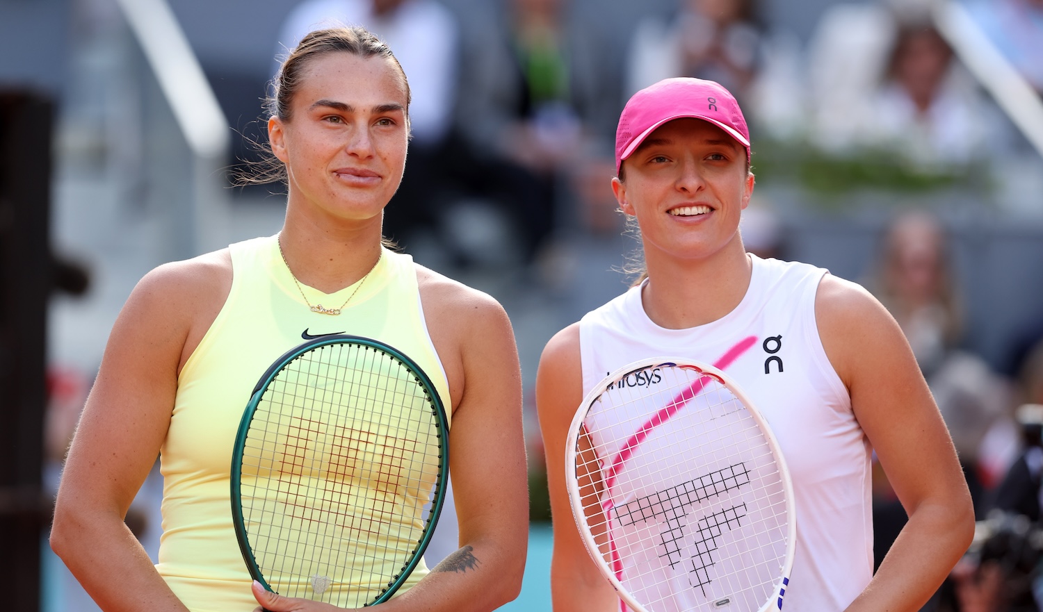 Aryna Sabalenka of Belarus and Iga Swiatek of Poland meet at the net prior to the Women's Singles Final match on Day Twelve of Mutua Madrid Open at La Caja Magica on May 04, 2024 in Madrid, Spain. (Photo by Julian Finney/Getty Images)