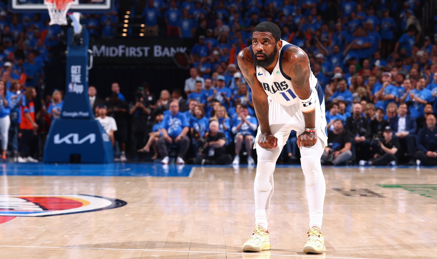 OKLAHOMA CITY, OK - MAY 9: Kyrie Irving #11 of the Dallas Mavericks looks on during the game against the Oklahoma City Thunder during Round Two Game Two of the 2024 NBA Playoffs on May 9, 2024 at Paycom Arena in Oklahoma City, Oklahoma. NOTE TO USER: User expressly acknowledges and agrees that, by downloading and or using this photograph, User is consenting to the terms and conditions of the Getty Images License Agreement. Mandatory Copyright Notice: Copyright 2024 NBAE (Photo by Zach Beeker/NBAE via Getty Images)