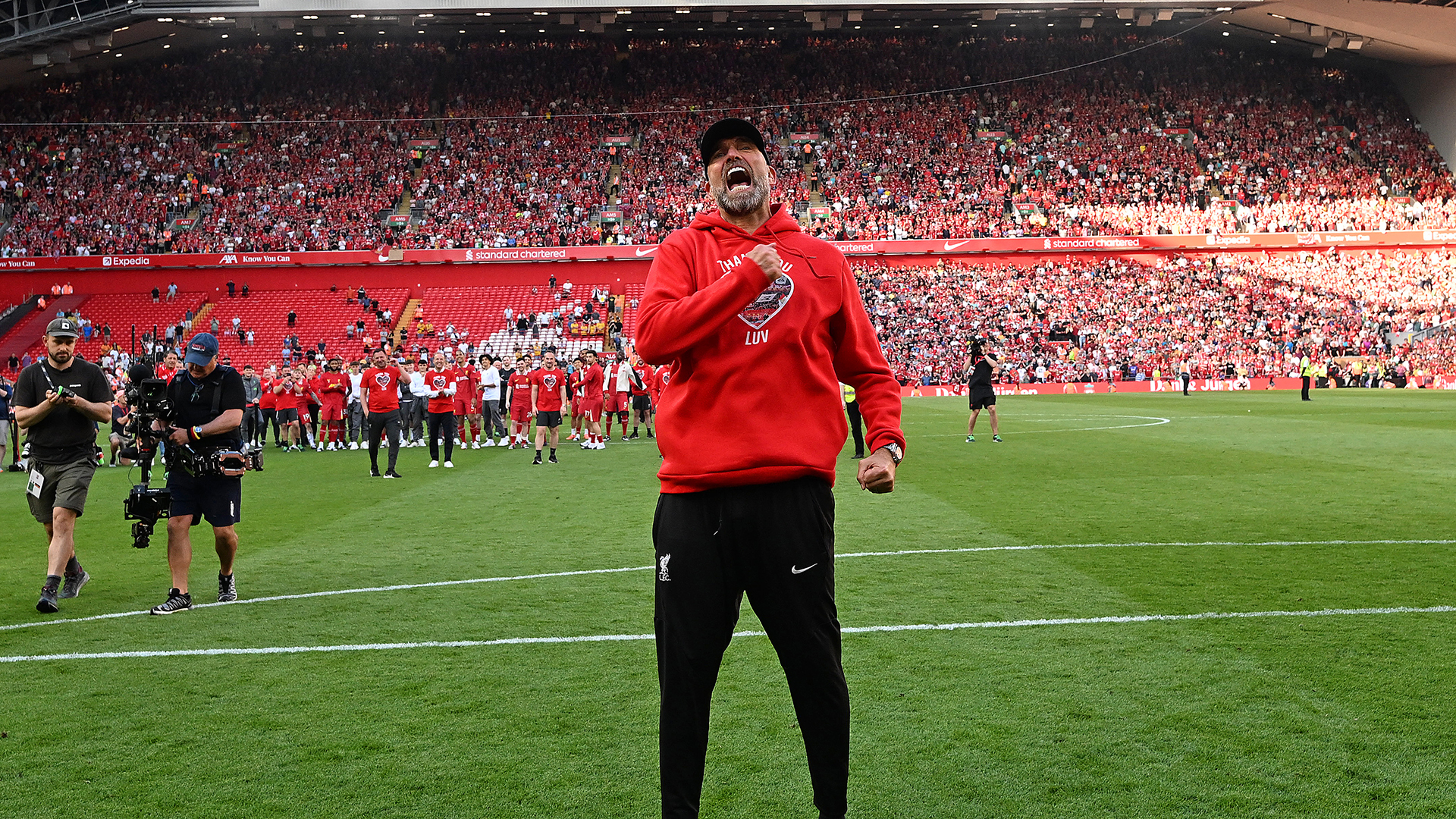 Jurgen Klopp manager of Liverpool showing his appreciation to the fans at the end of the Premier League match between Liverpool FC and Wolverhampton Wanderers at Anfield on May 19, 2024 in Liverpool, England.