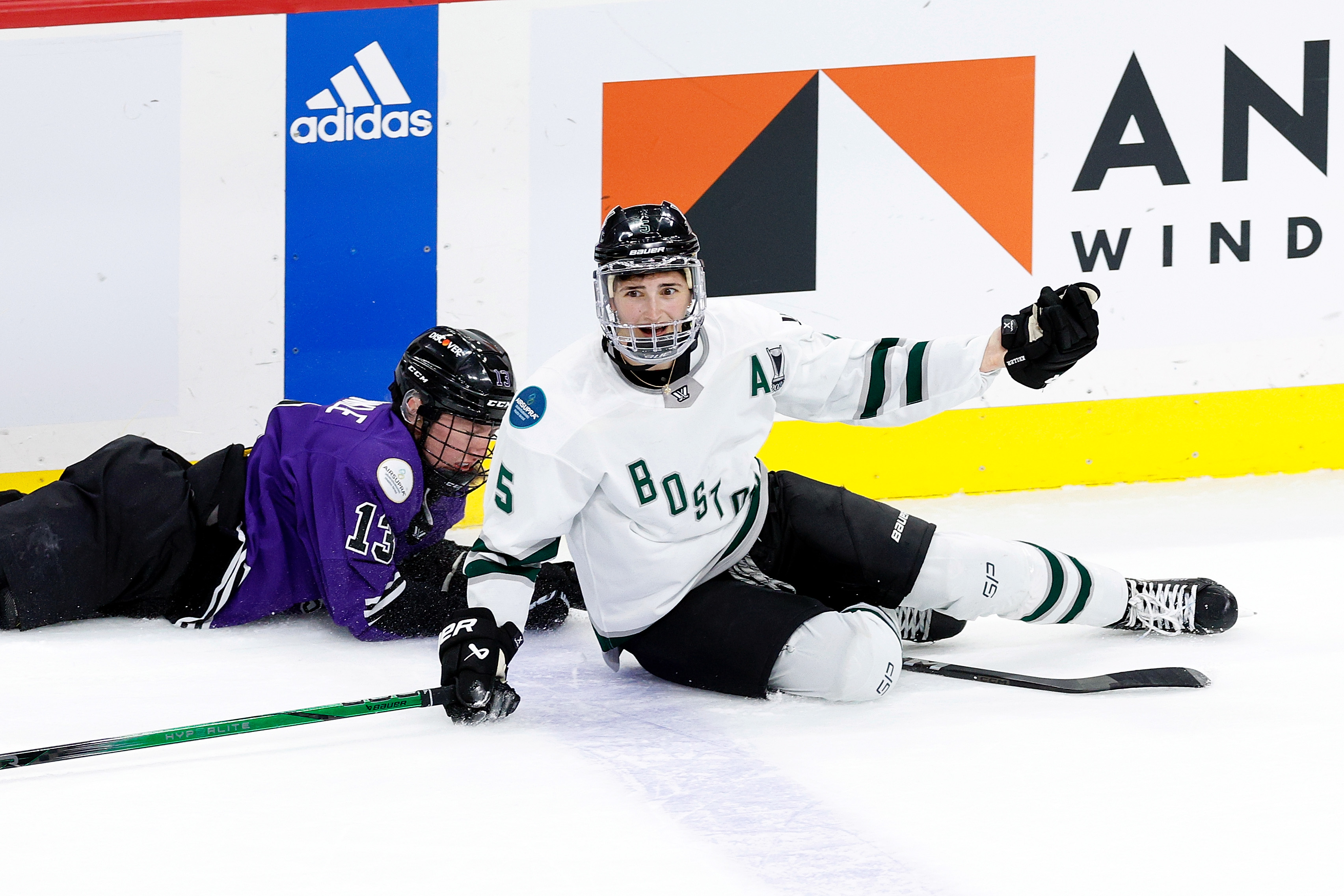 Megan Keller #5 of Boston reacts to a collision with Grace Zumwinkle #13 of Minnesota