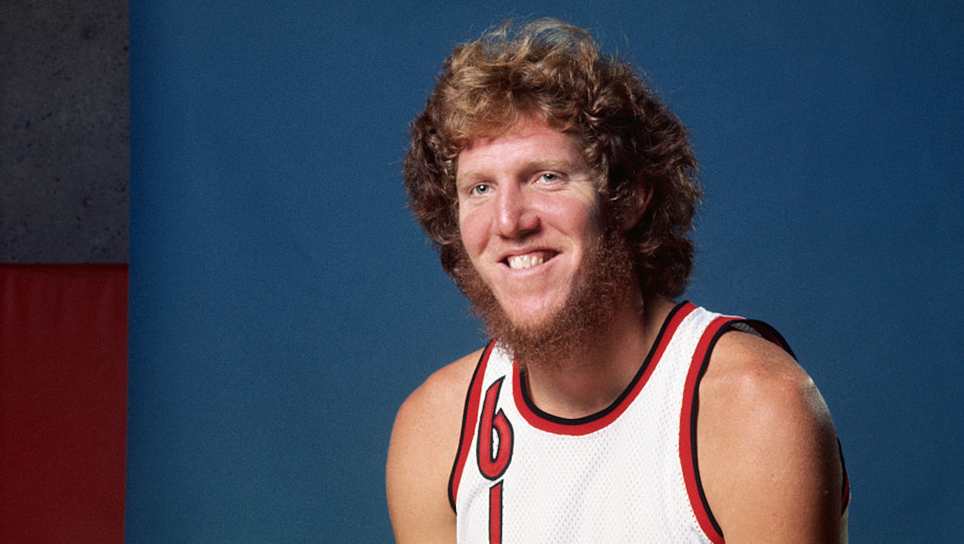 Portland Trail Blazers' Bill Walton, who received many accolades for his performance on the court, is depicted here. Walton would later go on to pursue a career off the court as a sports broadcaster and an actor in feature films.