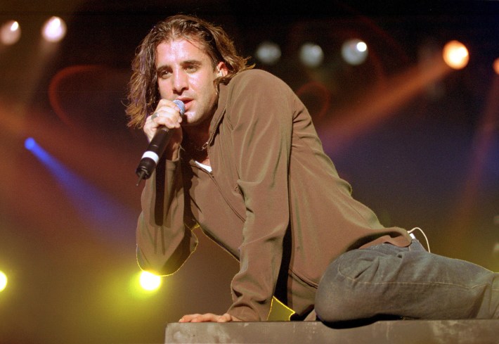 Scott Stapp of Creed performs the tour opener at the Aragon Ballroom in Chicago. October 14, 1999. (Photo by James Crump/WireImage)