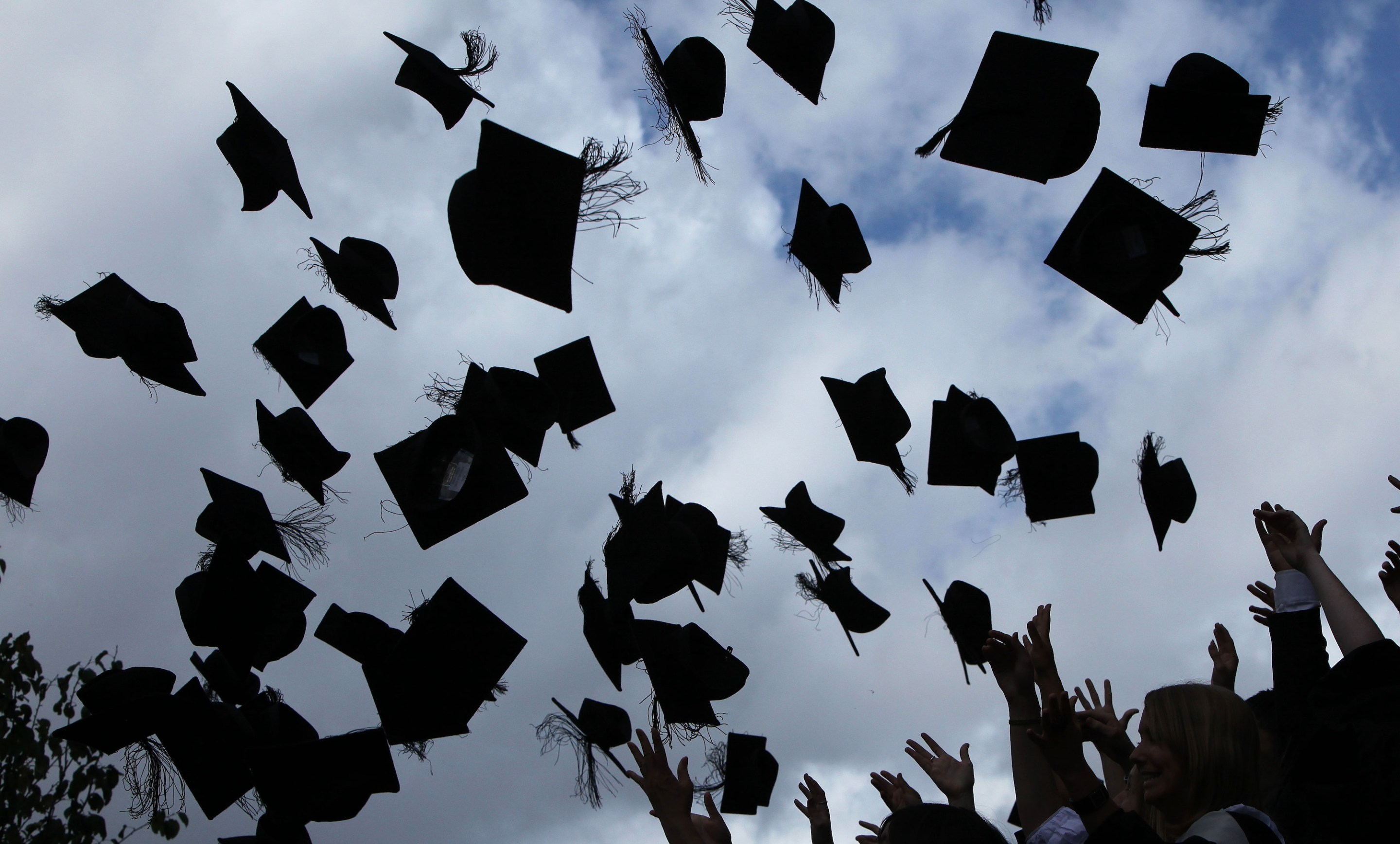 Students at the University of Birmingham take part in their degree congregations as they graduate on July 14, 2009 in Birmingham, England. Over 5000 graduates will be donning their robes this week to collect their degrees from The University of Birmingham. A recent survey suggested that there are 48 graduates competing for every job.