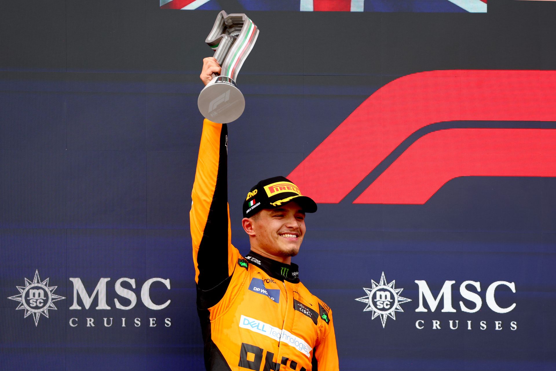 Second placed Lando Norris of Great Britain and McLaren celebrates on the podium during the F1 Grand Prix of Emilia-Romagna.