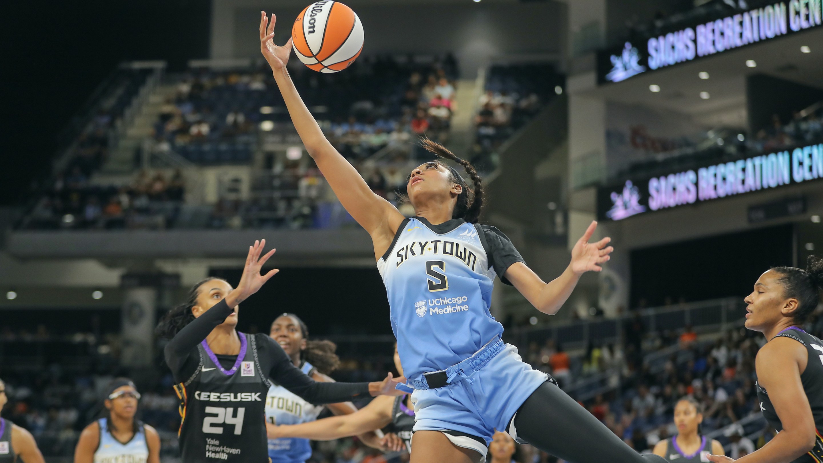 Angel Reese #5 of the Chicago Sky grabs the rebound during he first half of a WNBA game against the Connecticut Sun