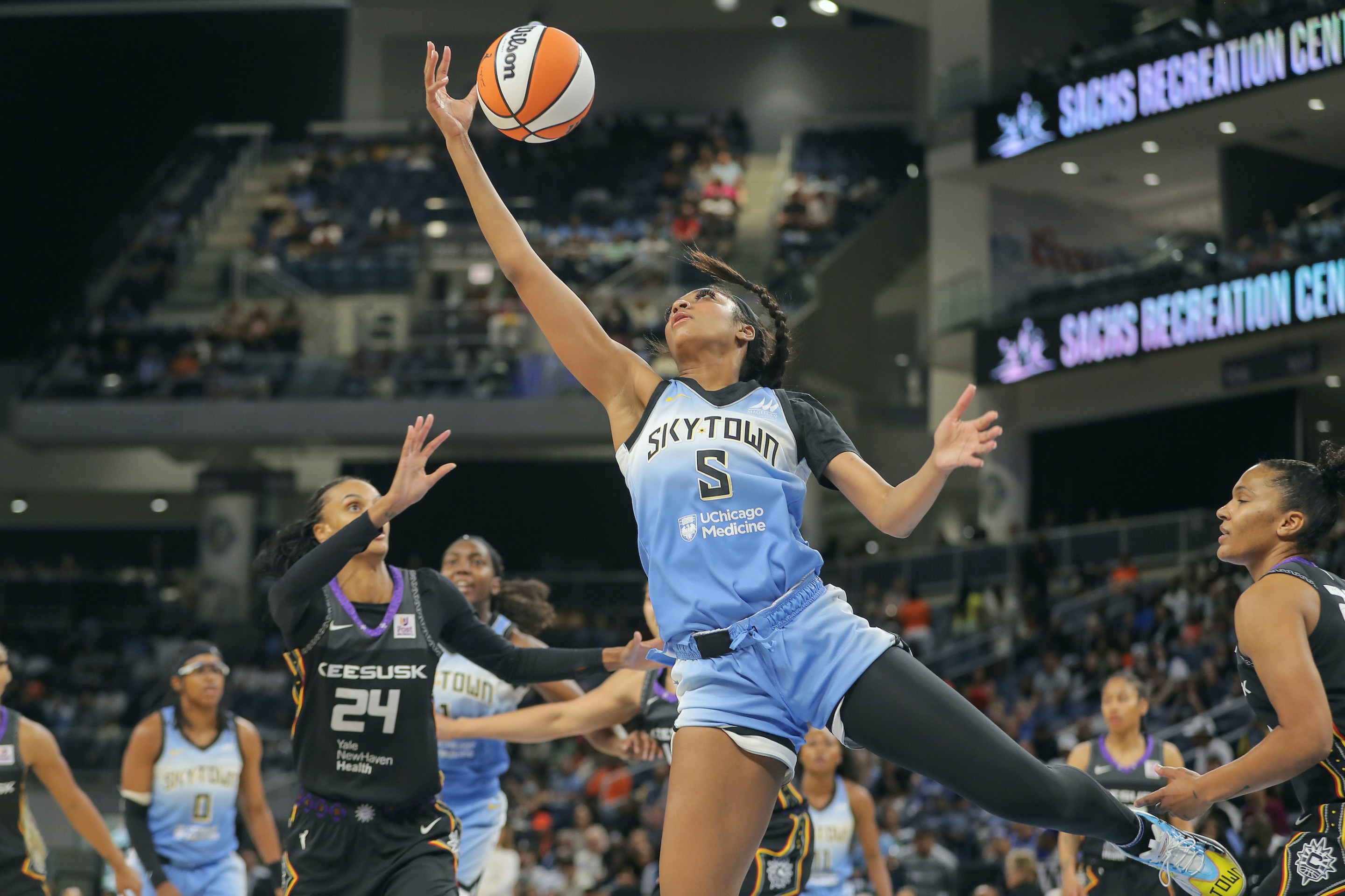 Angel Reese #5 of the Chicago Sky grabs the rebound during he first half of a WNBA game against the Connecticut Sun