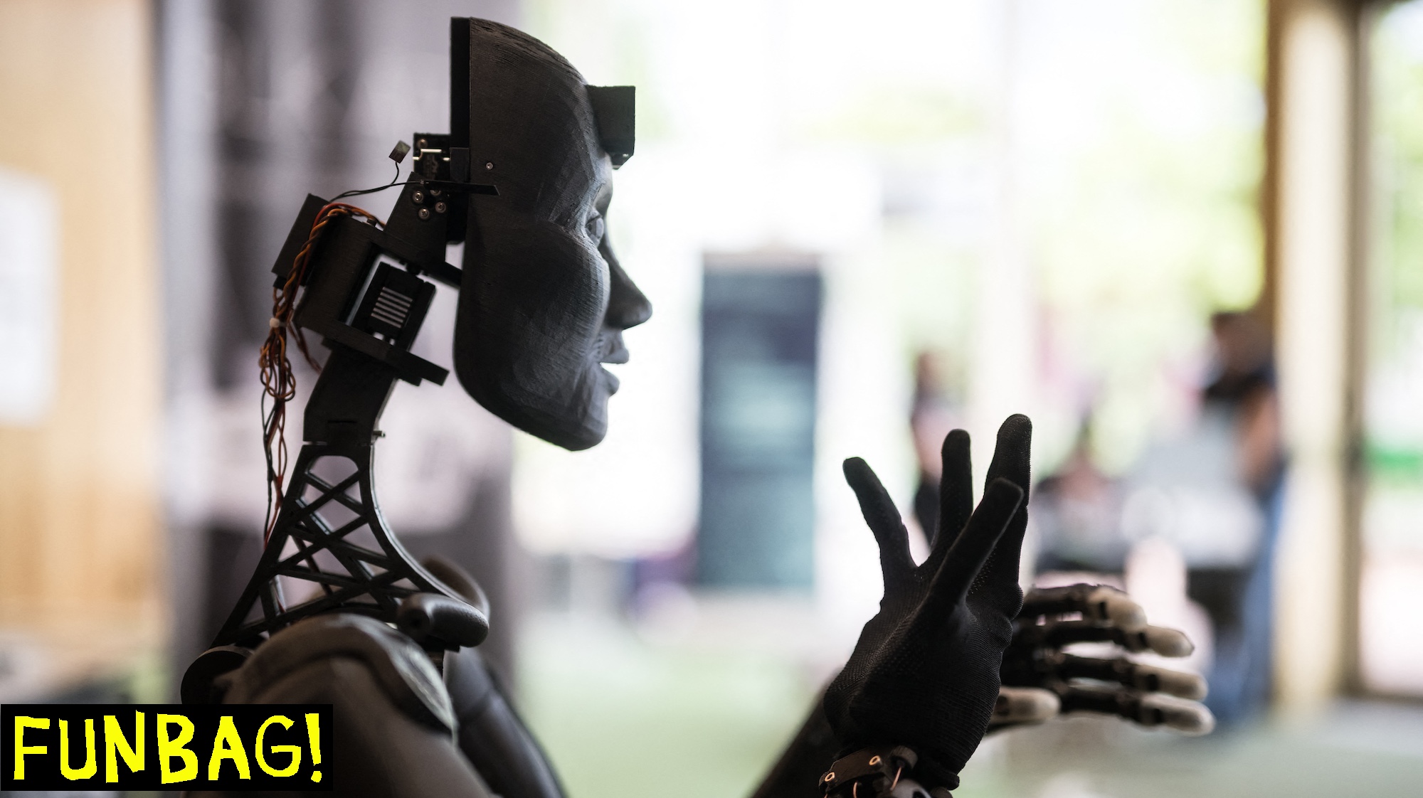 A robot using artificial intelligence is displayed at a stand during the International Telecommunication Union (ITU) AI for Good Global Summit in Geneva, on May 30, 2024. Humanity is in a race against time to harness the colossal emerging power of artificial intelligence for the good of all, while averting dire risks, a top UN official said. (Photo by Fabrice COFFRINI / AFP)