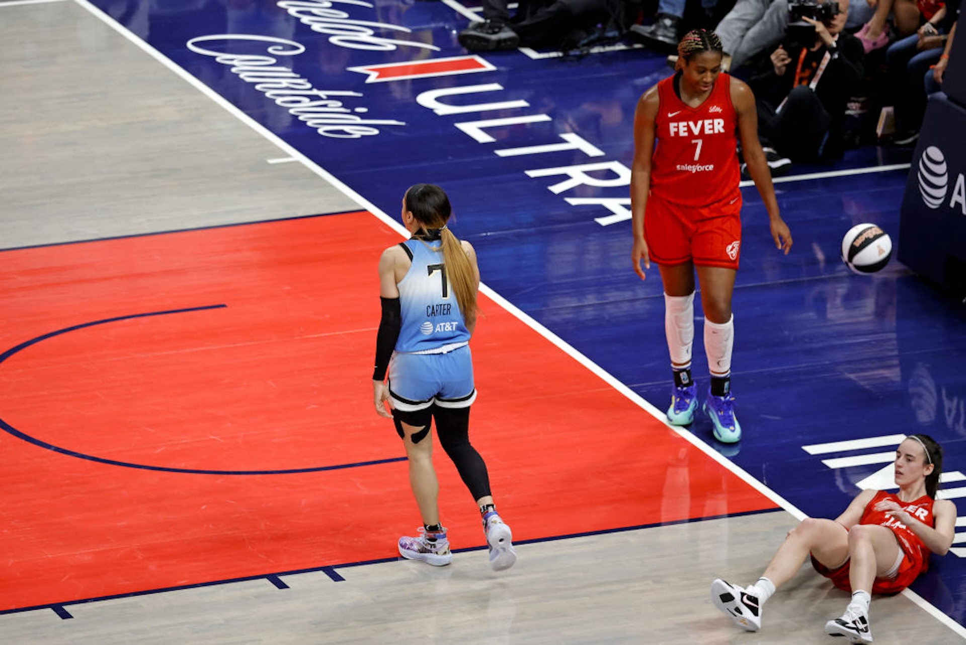 Chicago Sky guard Chennedy Carter (7) is whistled for a flagrant foul for knocking Indiana Fever guard Caitlin Clark (22) to the ground on June 1, 2024, at Gainbridge Fieldhouse in Indianapolis, Indiana.
