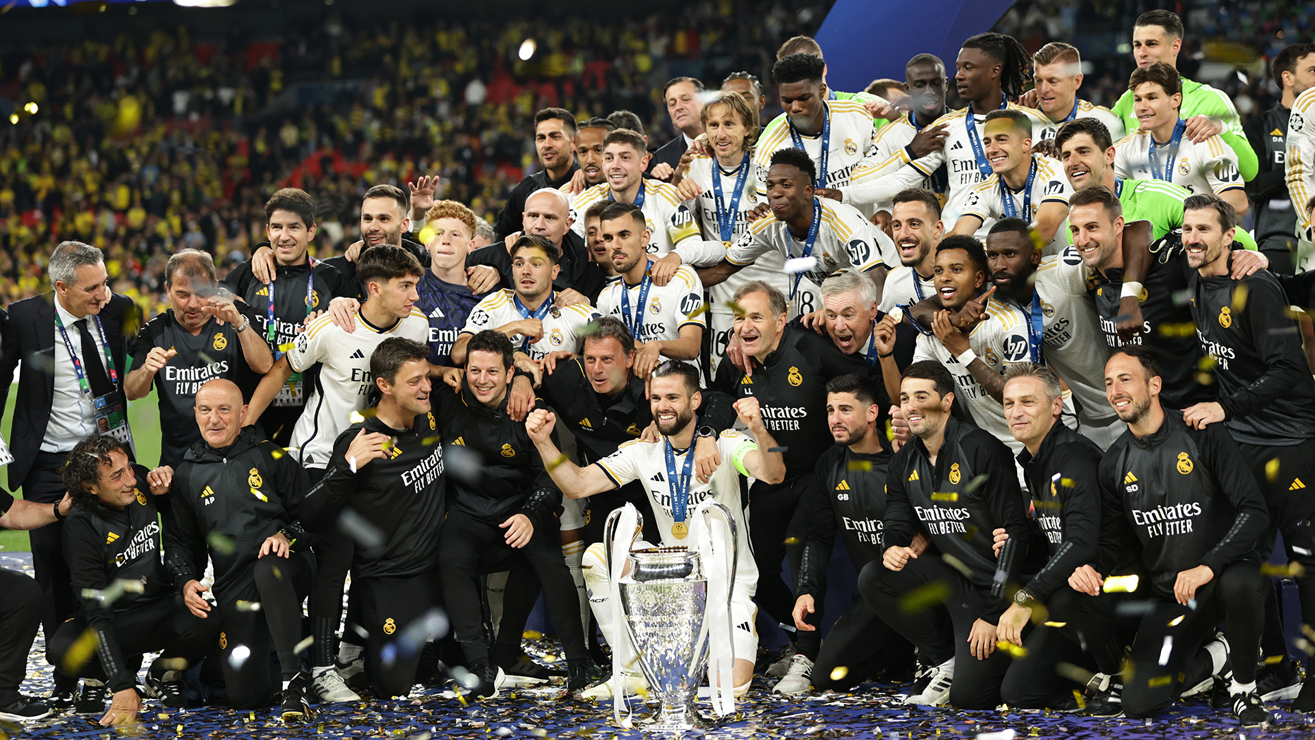 Real Madrid's Spanish defender Nacho Fernandez (C) and Real Madrid's players lift the trophy to celebrate their victory at the end of the UEFA Champions League final football match between Borussia Dortmund and Real Madrid at Wembley Stadium in London, United Kingdom on June 01, 2024.